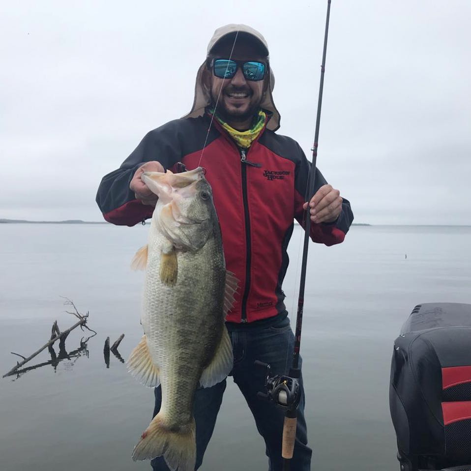 Guide with a 9-pound Sugar Lake bass